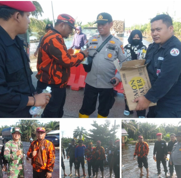 Bentuk apresiasi MPC Pemuda Pancasila kabupaten Pelalawan berikan Bantuan Air minum  water lemon dan nestle Bear brand untuk petugas polisi dan TNI