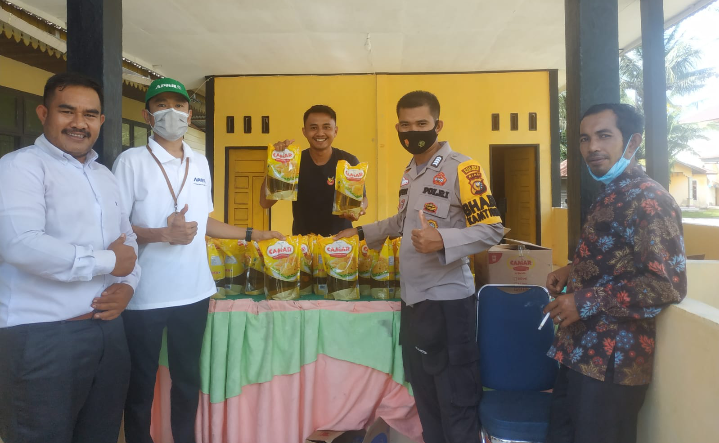 Pengamanan Pasar Murah Minyak Goreng, Kasubsektor Pelalawan Iptu Legito: Program Ini Dari PT RAPP Bantu Masyarakat Kec. Pelalawan