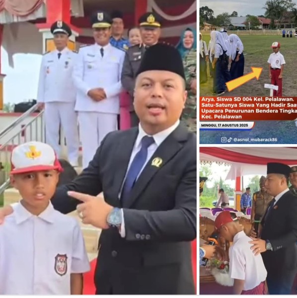 Anggota dewan Asnol' apresiasi siswa SD yang menghadiri saat penurunan bendera merah putih Sendirian dari (SD) kelurahan Pelalawan di HUT RI ke 80