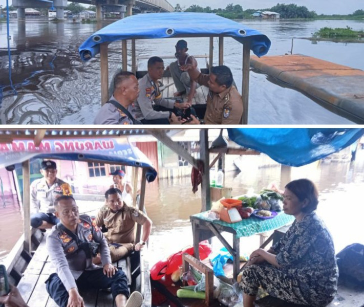 Kapolsubsektor Pelalawan Iptu Legito di dampingi Kepala Desa Sering dan Bhabinkamtibmas menyusuri pinggiran sungai Kampar dampak pembukaan pintu pembuangan air PLTA Koto Panjang Kampar.