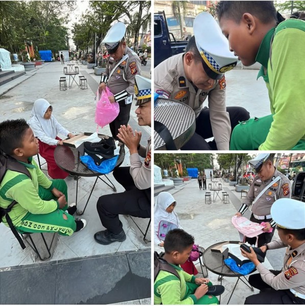 Satlantas Polres Pelalawan tidak hanya hadir mengatur lalu lintas, tetapi juga menghadirkan secercah harapan bagi anak-anak sekolah.