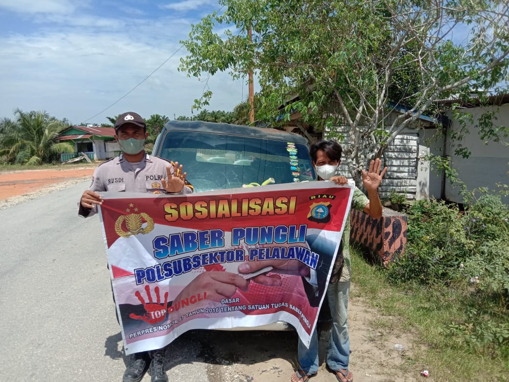 Personil Piket Yanmas Polsubsektor Pelalawan Sosialisasi Saber Pungli