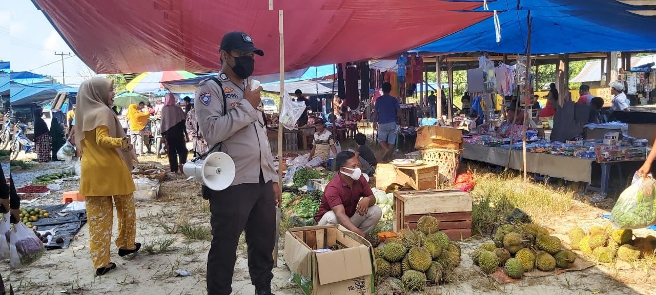 Ciptakan Situasi Aman Dan Kondusif Pengunjung Pasar Tradisional, Kuala Tolam Bhabinkamtibmas Intensifkan Patroli